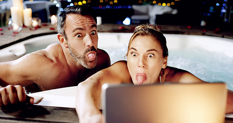 Image showing Tablet, spa and crazy couple take selfie with tongue for social media or the internet or online for a romantic night date. Celebration, web or funny face by people on vacation or holiday in a hot tub