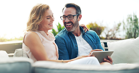 Image showing Happy, couple and tablet for online shopping, streaming or reading, social media communication or ecommerce on sofa. Woman, man and relax together on weekend with technology, movie service or network