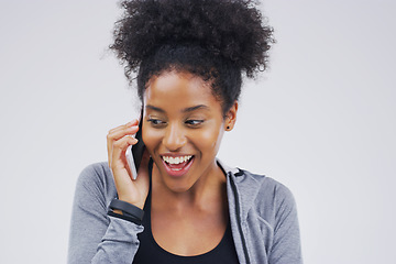 Image showing Phone call, funny and black woman talking in studio isolated on a white background with mockup. Cellphone, excited and African female person in communication, speaking or discussion, network or chat.