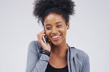 Image showing Phone call, smile and black woman speaking in studio isolated on a white background with mockup. Cellphone, happy and African female person in communication, conversation or discussion with contact.