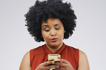 Image showing Social media, girl and black woman with a smartphone, attitude and communication on a white studio background. Female person, doubt or model with a cellphone, mobile app and online reading or contact