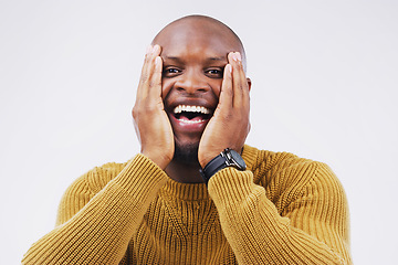 Image showing Excited, surprise and portrait of a man in studio with a winning, wow or omg facial expression. Happy, smile and face of African male model with shock to celebrate an achievement by white background.