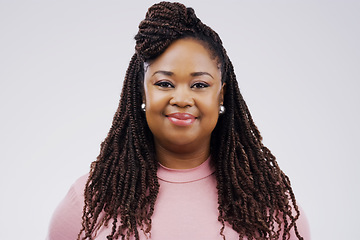 Image showing Portrait, smile and braids with a black woman in studio on a gray background for beauty or fashion. Face, happy and natural with an attractive young female person feeling confident in trendy clothes