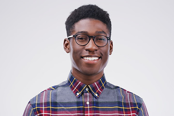 Image showing Smile, portrait of black man with glasses and happy against a white background. Nerd or geek, happiness and African male smiling with proud facial expression against a studio backdrop for confidence