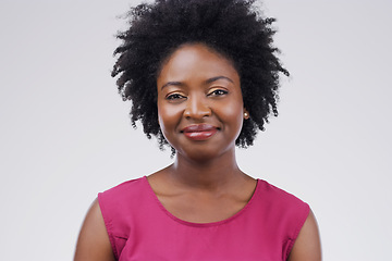 Image showing Portrait, happy and afro with a black woman in studio on a gray background for beauty or fashion. Face, smile and natural with an attractive young female person feeling confident in trendy clothes