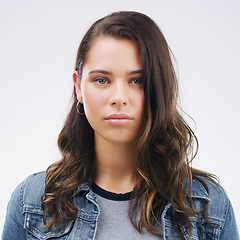 Image showing Face, serious portrait and a woman in studio with healthy skin, natural beauty and cosmetics. Headshot of a young female model with a facial expression isolated on a white background from Canada