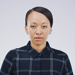 Image showing Serious, face portrait and woman in studio with healthy skin, natural beauty and cosmetics. Headshot of a young african female model from South Africa isolated on a white background with facial glow