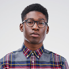 Image showing Face portrait, serious nerd and black man in studio isolated on white background. African, geek and male person with glasses from South Africa with fashion, style and pose with clothes for confidence