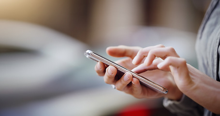 Image showing Woman hands, smartphone and scroll social media in the city with communication and technology outdoor. Female person online in urban street, connectivity and mobile app with mockup space and texting