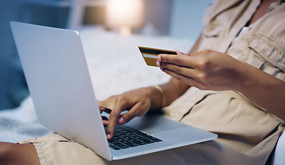 Image showing Credit card, woman hand and night in a bed with online shopping and computer with purchase. Bedroom, internet store and ecommerce deal of a female person in a home trying to pay on a web laptop app