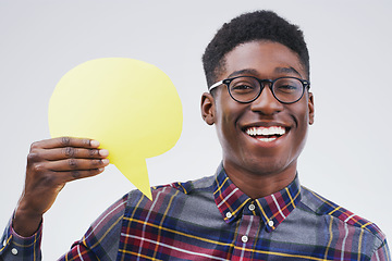 Image showing Happy black man, portrait and speech bubble for social media, question or FAQ against a white studio background. Excited African male person with smile or sign in comment, message or mockup space