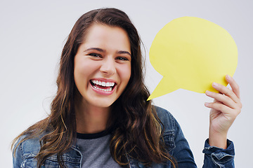 Image showing Happy woman, portrait smile and speech bubble in social media, question or FAQ against a white studio background. Female person smiling with shape, symbol or sign for comment, message or mockup space