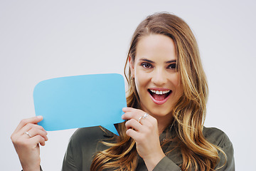 Image showing Happy woman, portrait smile and speech bubble for question, FAQ or social media against a white studio background. Excited female person smiling with shape sign for comment, message or mockup space