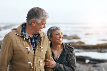 Image showing Senior couple, relax and beach walk outdoor with smile from marriage and love. Happy, elderly people and mockup by a ocean and sea on holiday with travel and walking on vacation with retirement