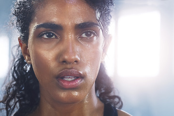 Image showing Sweating, woman breathing and face taking a break from fitness, exercise and workout. Gym, Indian female person and tired face of an athlete after sports and wellness club training for health