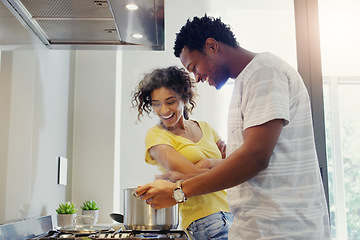 Image showing Cooking, love and food with couple in kitchen for bonding, breakfast and morning. Happiness, smile and health with man and woman preparing meal together at home for relax, nutrition and wellness