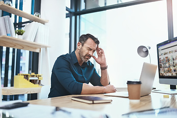 Image showing Stress, headache and businessman with laptop in the office while working on a corporate project. Medical emergency, healthcare and mature male employee with a migraine and pain in the workplace.