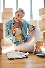 Image showing Portrait, woman and paperwork on the floor in apartment for investing and savings in a contract. Boxes, invest and document in living room of a new house with lease for investment and finance.