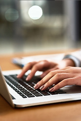 Image showing Laptop, keyboard and hands of a person at desk for work, internet and connection at night. Business, closeup and a secretary or receptionist typing on a computer for late admin online in an office