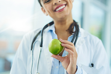 Image showing Hands, doctor and smile of woman with apple for nutrition, healthy diet and wellness. Medical professional, nutritionist and fruit for vitamin c, healthcare or natural food for vegan health benefits
