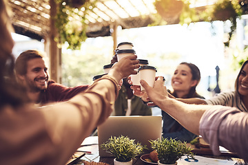 Image showing Team building, cheers and people with coffee in a meeting or discussion for a creative project in a cafe. Diversity, collaboration and professional employees with a latte for a toast in a restaurant.