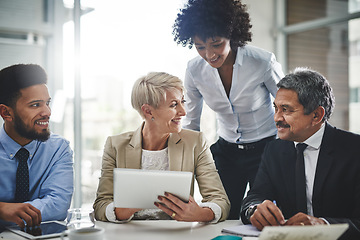 Image showing Business woman, meeting and tablet planning with company contract and deal with conversation. Staff, communication and paperwork with a team with diversity coworkers working on a job strategy