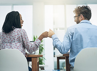 Image showing Back, teamwork and fist bump celebration with business people in their office, working together on a company project. Motivation, collaboration and friends or colleagues celebrating their success