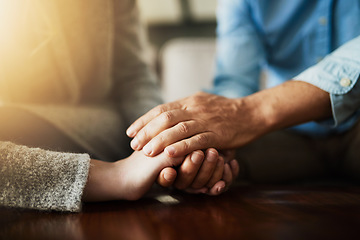 Image showing Holding hands, senior couple and life insurance support with kindness in a house. Home, love and elderly people with empathy, hope and trust with solidarity for grief care and marriage together