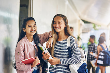 Image showing Girl friends, student portrait and school with learning books, study and smile on campus. Teenager, young teen and girls with happiness and happy together with textbook ready to start education class