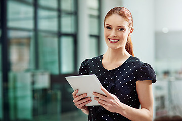 Image showing Business woman, portrait and smile with tablet in office for online planning, internet and website for insight in Ireland. Happy female entrepreneur, digital technology and connection with confidence