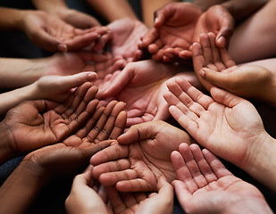 Image showing People, diversity and open palm with support in a community with unity and care. Group, helping and hands together for charity with donation and global solidarity for poverty with diverse team.