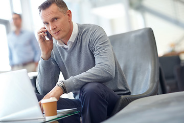 Image showing Phone call, travel and business man in airport on laptop for conversation, discussion and planning. Corporate, trip and portrait of manager on smartphone for networking, b2b communication and meeting