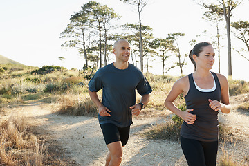 Image showing Forest, fitness and running couple training, workout and doing morning exercise for health and wellness together. Sport, man and woman runner run with athlete on a mountain for sports or energy
