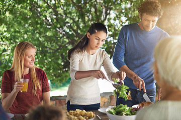 Image showing Food, salad and help with family at lunch in nature for health, bonding and celebration. Vacation, barbecue and event with parents and children eating together for garden, generations and wellness