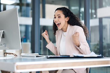 Image showing Celebration, good news and businesswoman with a fist pump in the office for success or achievement, Computer, winner and professional female employee with corporate goal to celebrate in the workplace