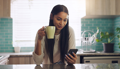 Image showing Reading, phone and woman with coffee in a kitchen relax with social media, app or texting. Smartphone, streaming and female drinking tea in her home on day off, calm and peaceful in her apartment