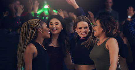 Image showing Dance, party and night with women in club for music, celebration and nightlife concert. Festival, disco and rave with friends dancing in crowd at social event for energy, techno and dj show