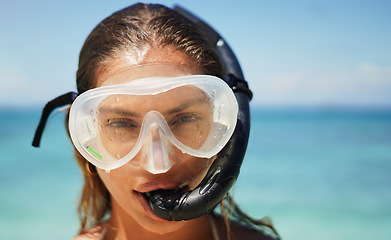 Image showing Travel, scuba diving and portrait of woman at the beach for swimming, summer and vacation. Tropical, holiday and gear with female diver and mask at Hawaii seaside for adventure, exotic and explore