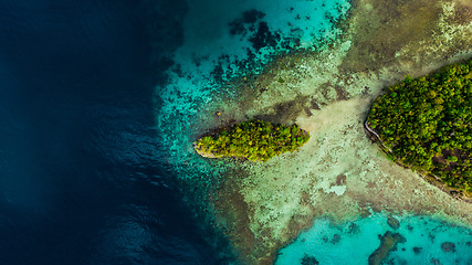 Image showing Drone, island and water for travel, adventure and exploring nature from above. Empty, paradise and top view of tropical nature, beauty and scenery in Indonesia for traveling, tourism and vacation