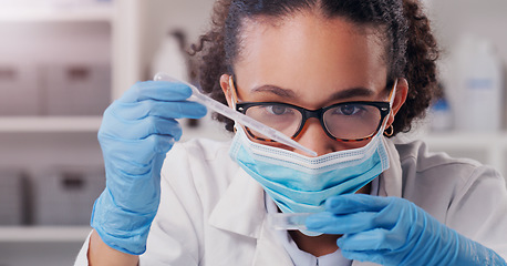 Image showing Woman, scientist, petri dish and medical mask with focus on futuristic research and virus data. Science, African female person and young employee working in a laboratory with chemistry test analysis