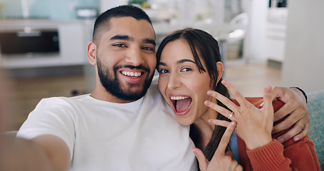 Image showing Couple, selfie and engagement ring in home portrait with happiness, romance and love on social media app. Man, woman and profile picture for marriage proposal, offer or celebration with smile on blog