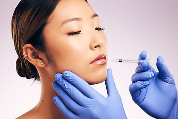 Image showing Lips injection, skincare and woman with plastic surgery in studio isolated on a white background. Cosmetics, syringe and female model with lip filler for dermatology, facelift treatment and beauty.