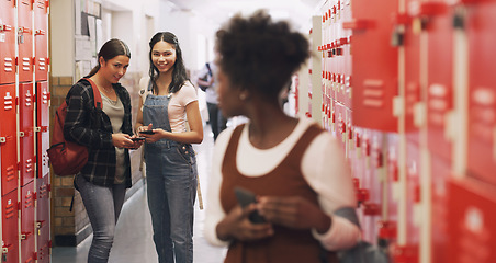 Image showing School bully and a girl with a phone for a secret, gossip or rude message online. Sad, anxiety and an African student on a mobile app with group whisper from students doing cyber bullying at class