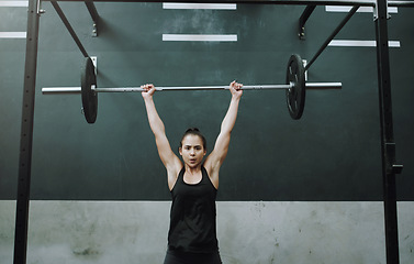 Image showing Weight lifting, strong and portrait of woman with barbell for gym training, exercise and intense workout. Fitness, deadlift and female body builder lifting weights for challenge, wellness or strength