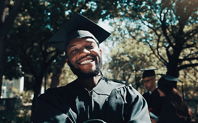 Image showing Graduation, portrait and smile of black man for achievement, education and celebrate success outdoor. Happy university student, male graduate and celebration event of degree, learning goals and pride