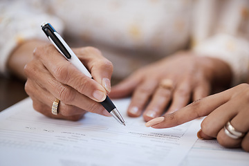 Image showing Hands, pen and closeup of a woman signing a document, contract or application with an advisor. Zoom of a female person with a signature for paperwork, form or agreement with a professional lawyer.