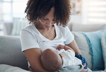 Image showing Love, living room and mother breastfeeding her baby for health, nutrition and wellness at home. Bonding, care and young woman nursing or feeding her newborn child milk on the sofa in the family house