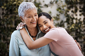 Image showing Happy, hug and portrait of a mother and woman in a garden on mothers day with love and gratitude. Smile, family and an adult daughter hugging a senior mom in a backyard or park for happiness