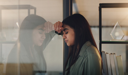 Image showing Business, window and woman with stress, night and mental health issue with fatigue, schedule and anxiety. Female person, tired employee and agent with depression, evening and mistake with burnout