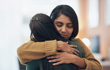 Image showing Friends, hug and support of women together in a house with love, care and empathy. Indian sisters or female family in a room while sad, depressed and hugging for comfort, trust and quality time